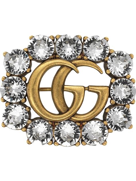 gucci metal brooch